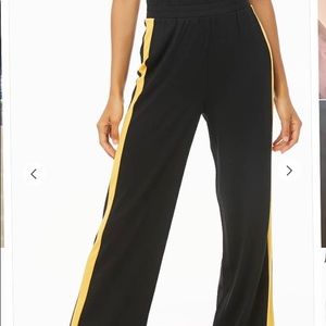 Long black and yellow pants